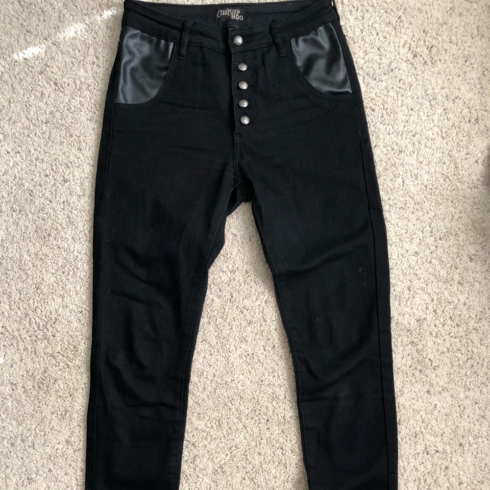 High waisted black denim with leather pocket